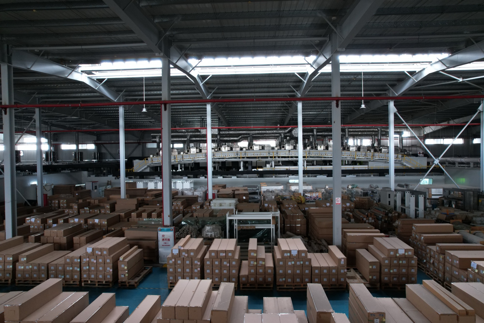 Packed window film rolls and cartons in the factory warehouse