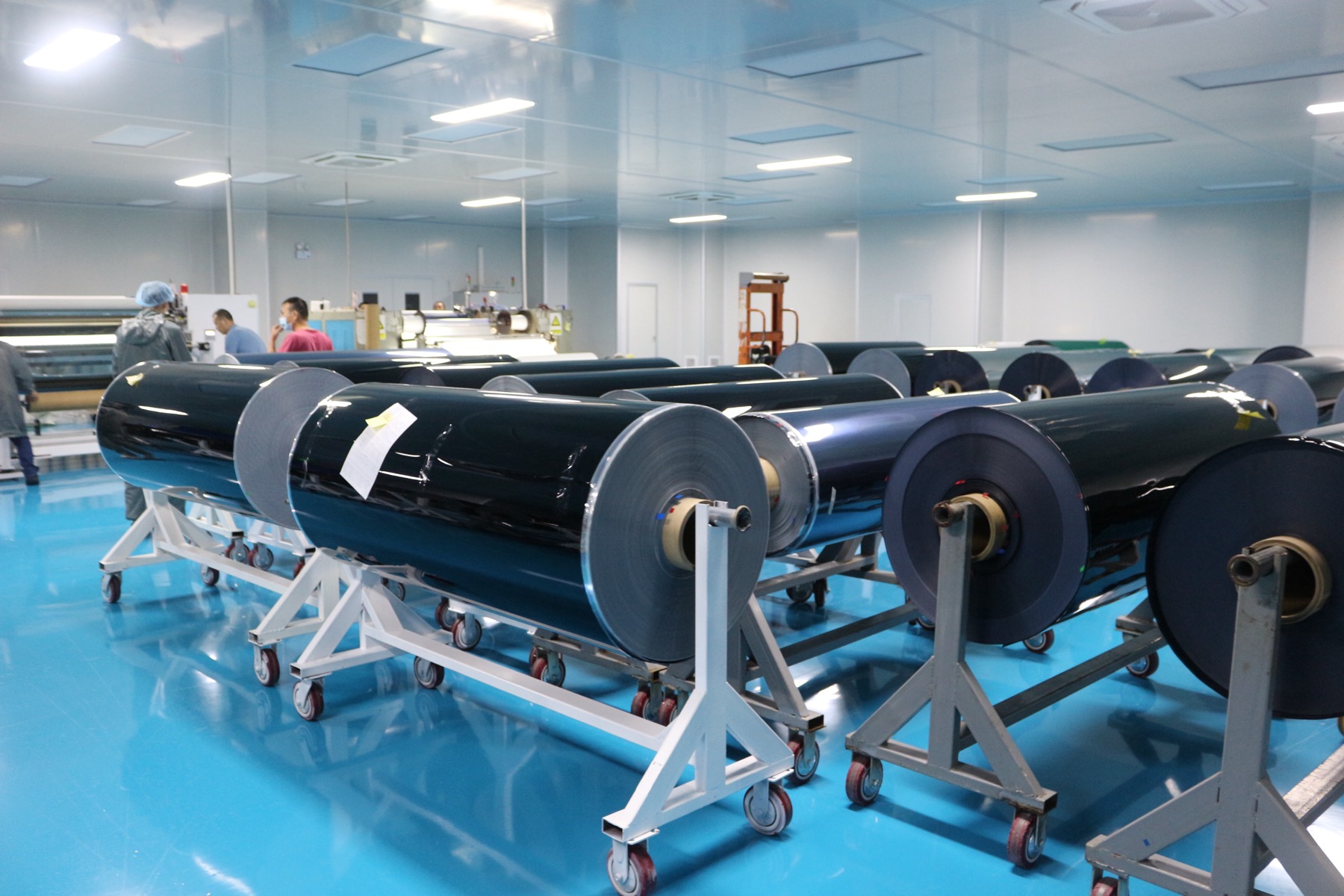 Large rolls of window film in the factory clean room