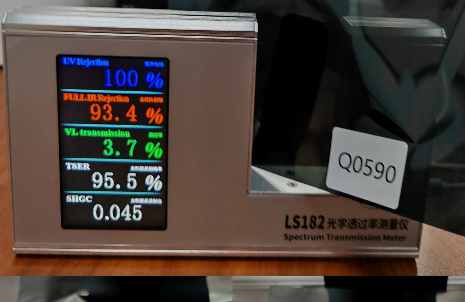 Window film sample tested with transmission meter